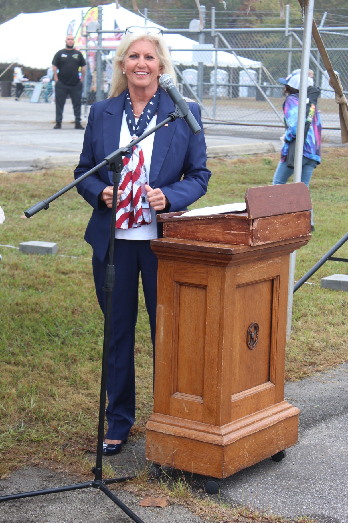 Guest speaker at the historic wooden podium during opening ceremonies