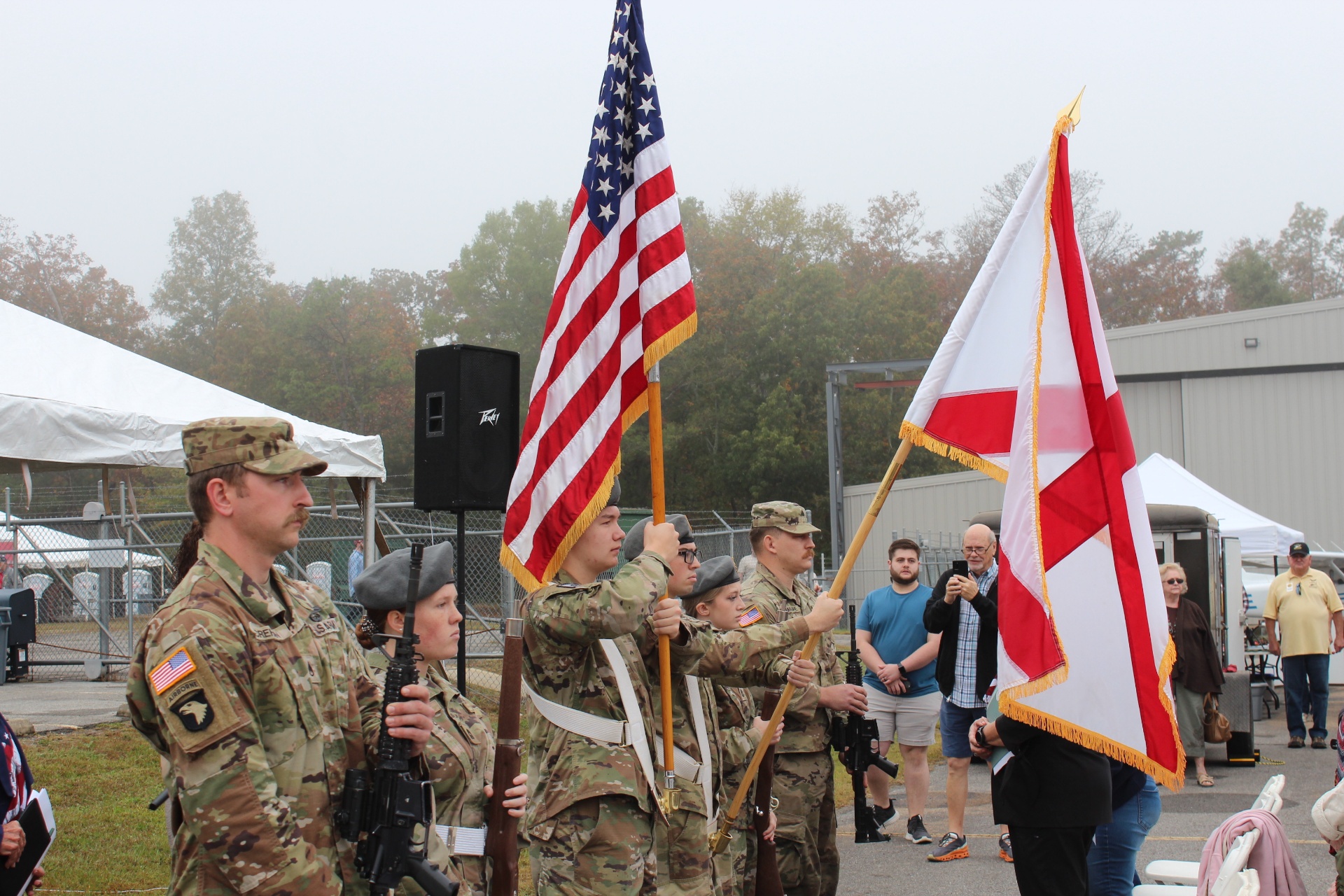 JROTC color guard presents the US and Alabama flags at the ceremony