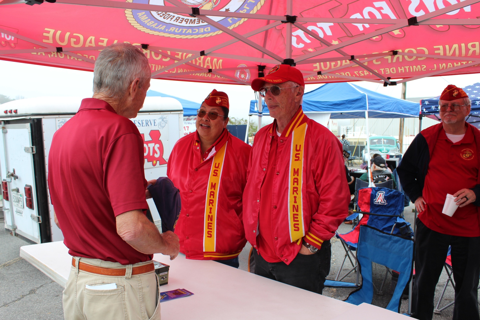 Marine Corps League members greeting a visitor