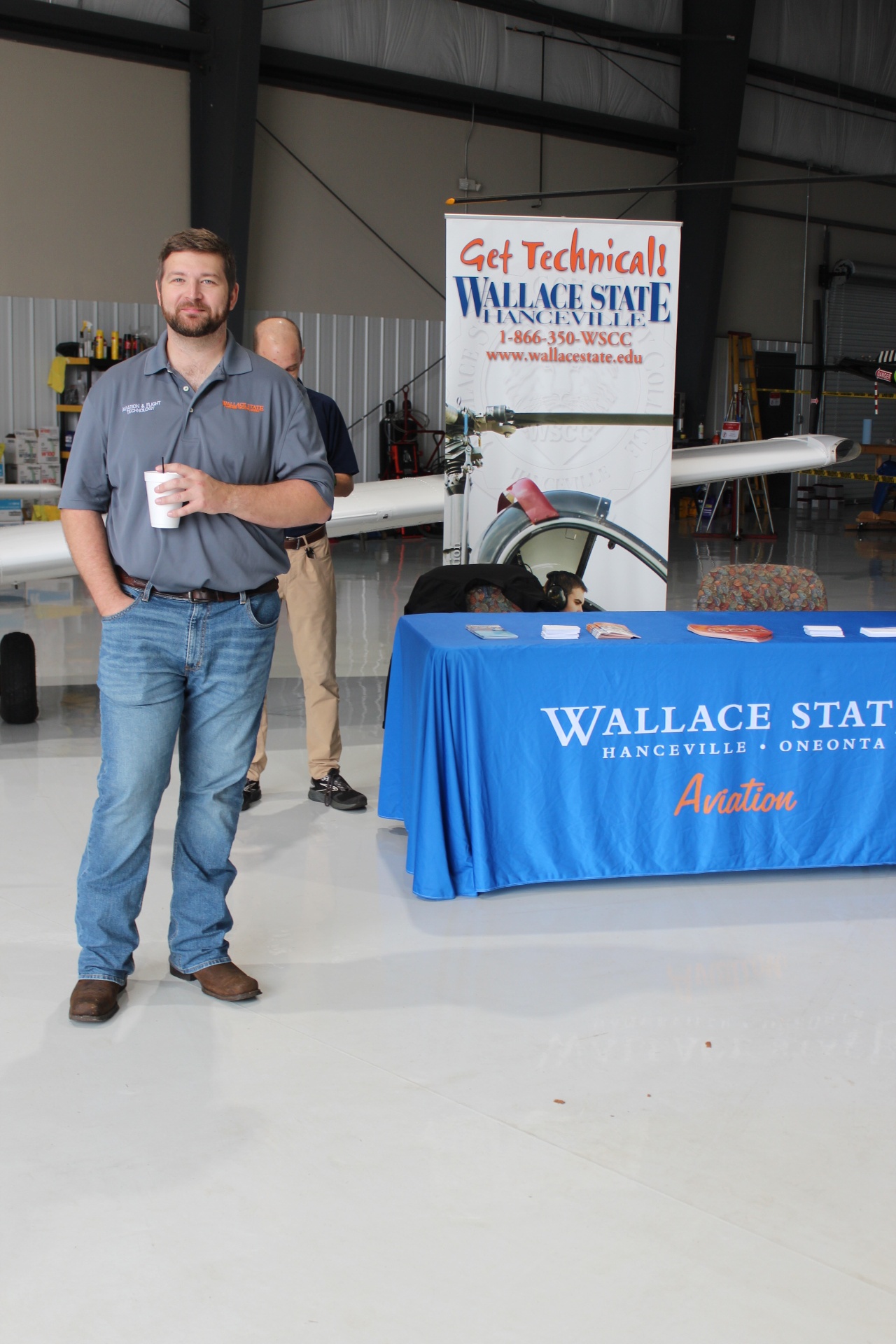 Wallace State Aviation & Flight Technology recruiter at the hangar booth