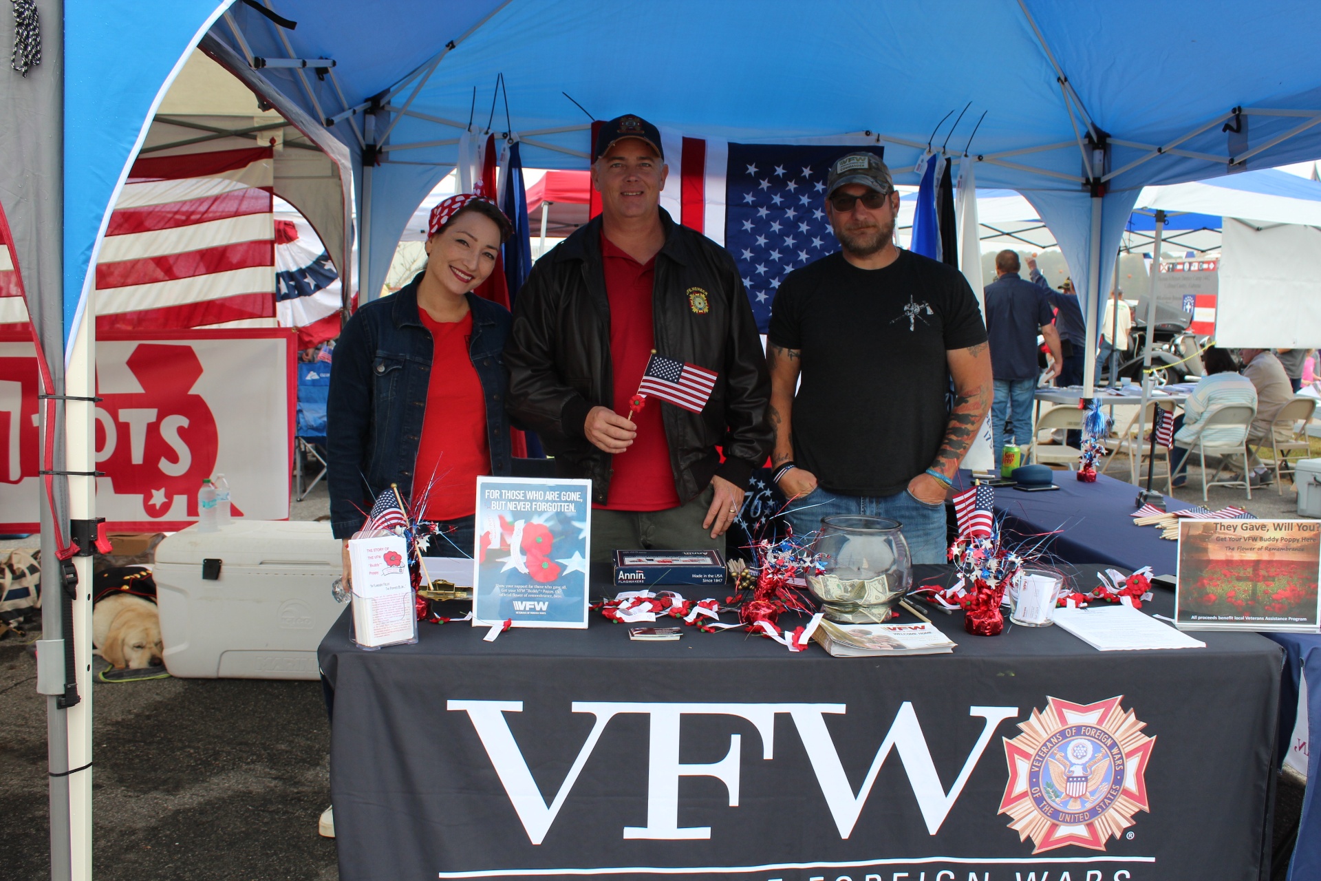 VFW Post volunteers with Buddy Poppy display