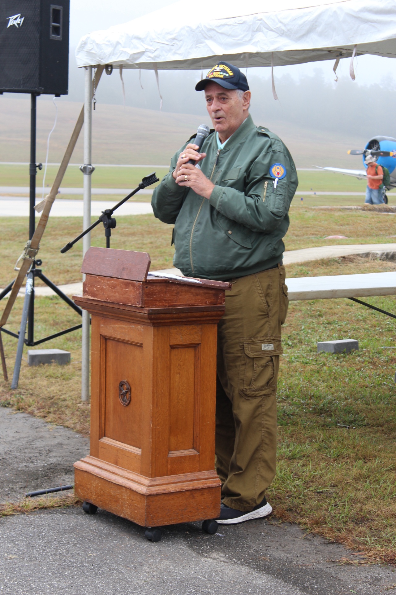 Vietnam veteran speaker at the podium during the ceremony