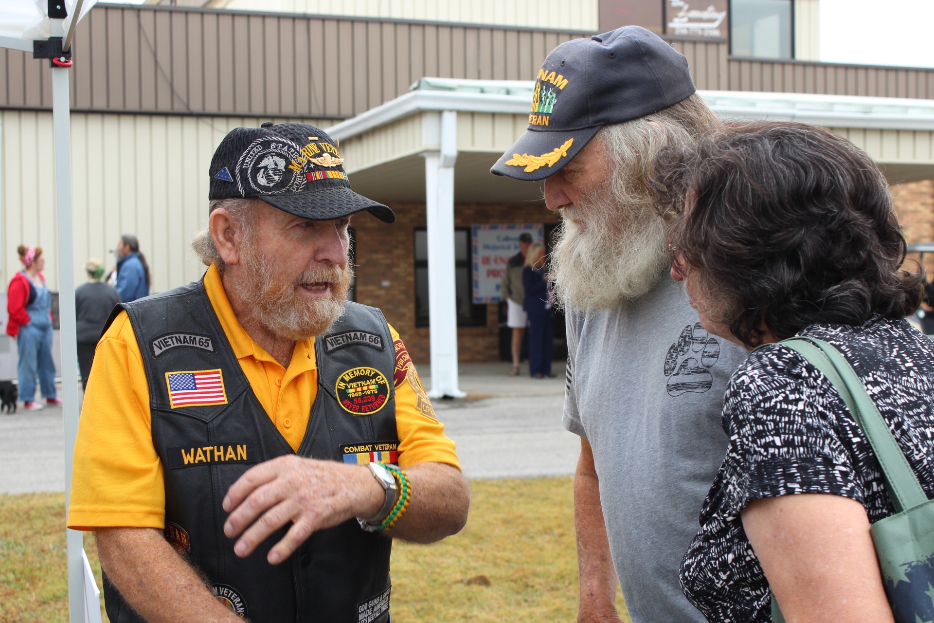 Vietnam Marine and Army veterans in conversation with a guest